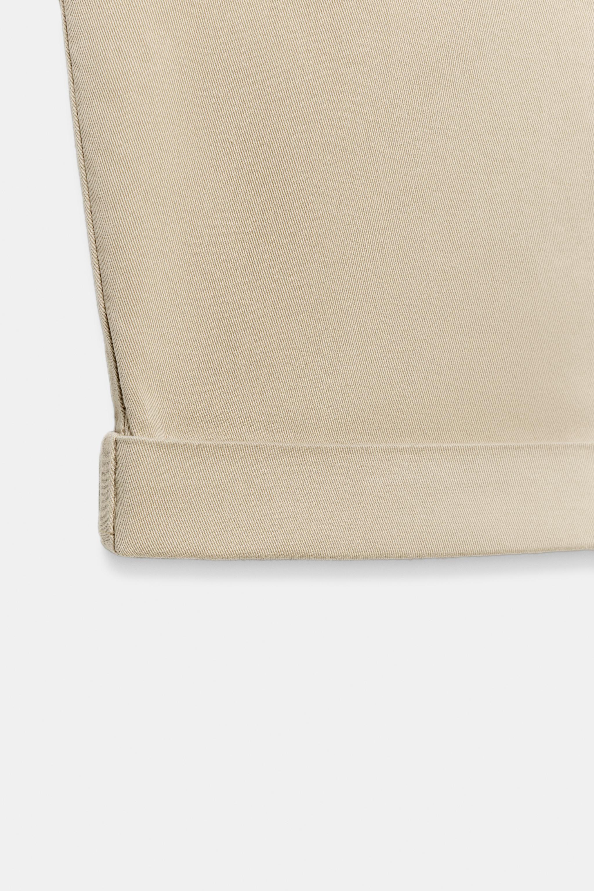 PANTALON CHINO BAS À REVERS